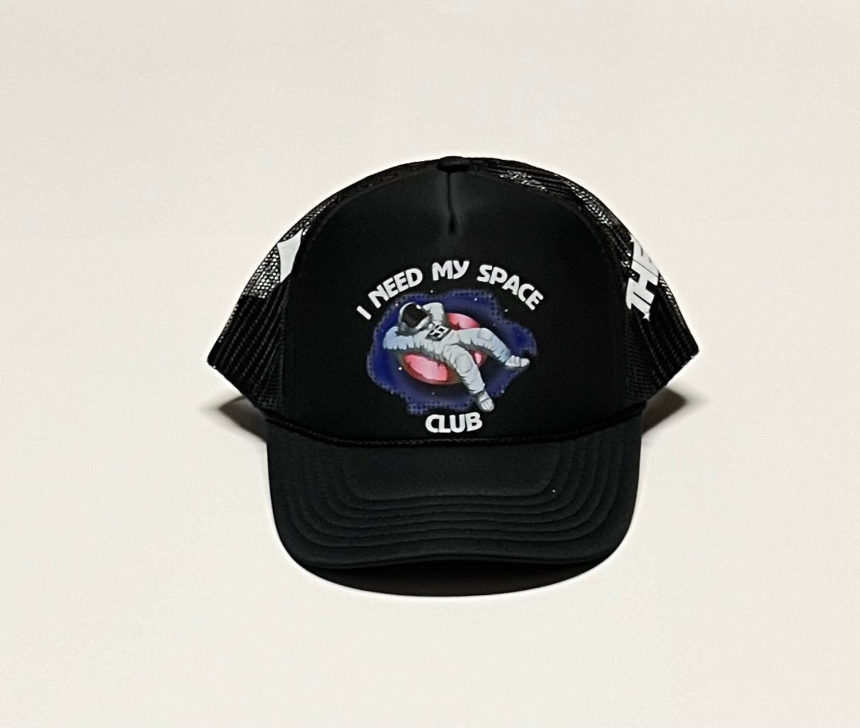 I need my space club night time trucker hat
