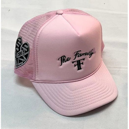 The Family font logo embroidered trucker hat
