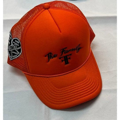The Family font logo embroidered trucker hat